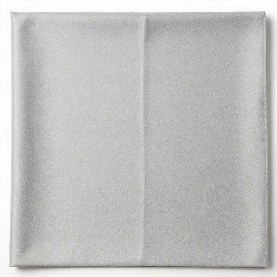 A folded square of pale grey suiting fabric